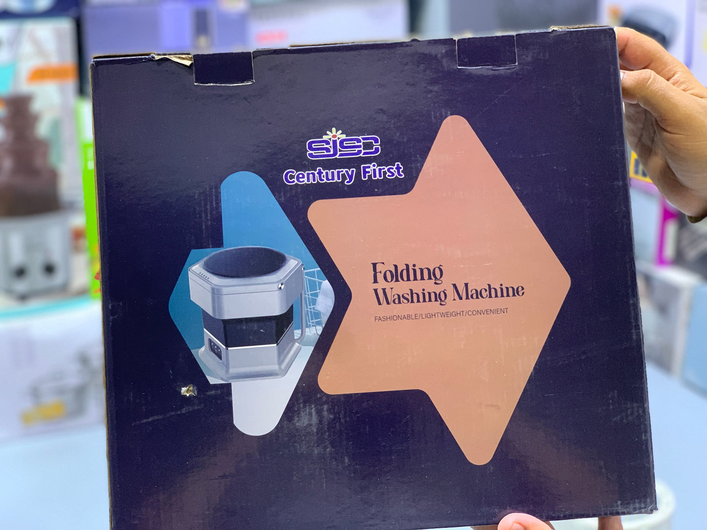 Folding portable washing machine